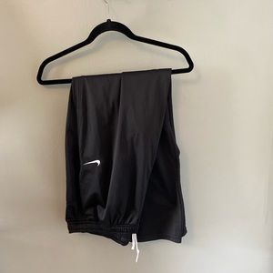 Straight leg, black fleece lined pants. Nike